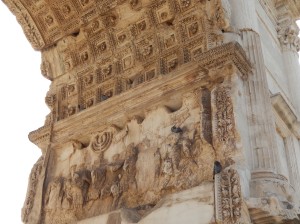 Arch of Titus, decorated with Roman propoganda showing booty taken from the sacking of the temple in Jerusalem