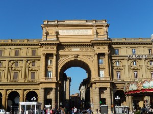 past the old town wall and entrance at Piazza della Repubblica