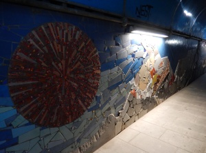 beautiful murals in the tunnel, by Argentinean artist Silvio Benedetto