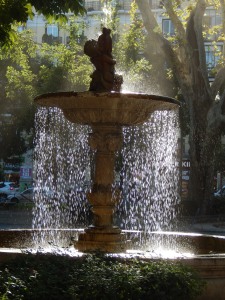 fountain sparkles in the sun